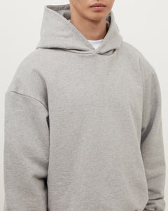 Stay Warm and Stylish with our Grey Essentials Hoodie
